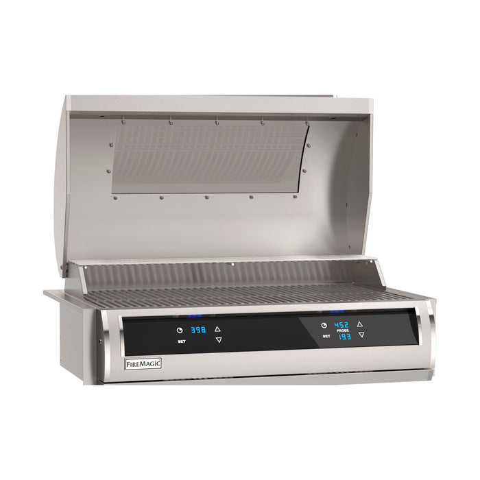 Fire Magic EL500i 30" Built-In Electric Grill with Magic View window, shown at an angle with the hood open, highlighting its spacious cooking area and Diamond Sear grids.