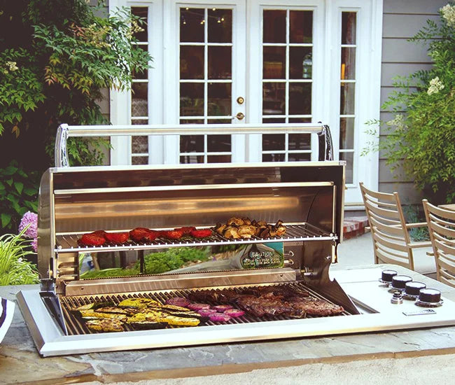 Fire Magic Legacy Regal I 30" Drop-In Grill in an outdoor kitchen setup, showcasing its sleek drop-in design and premium grilling performance.