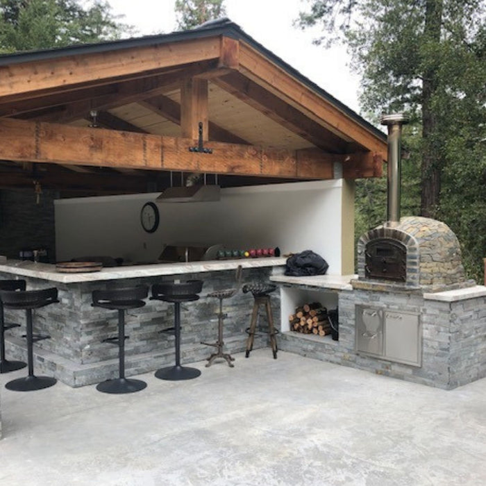 Lisboa Premium Pizza Oven integrated into a covered outdoor kitchen bar setting.