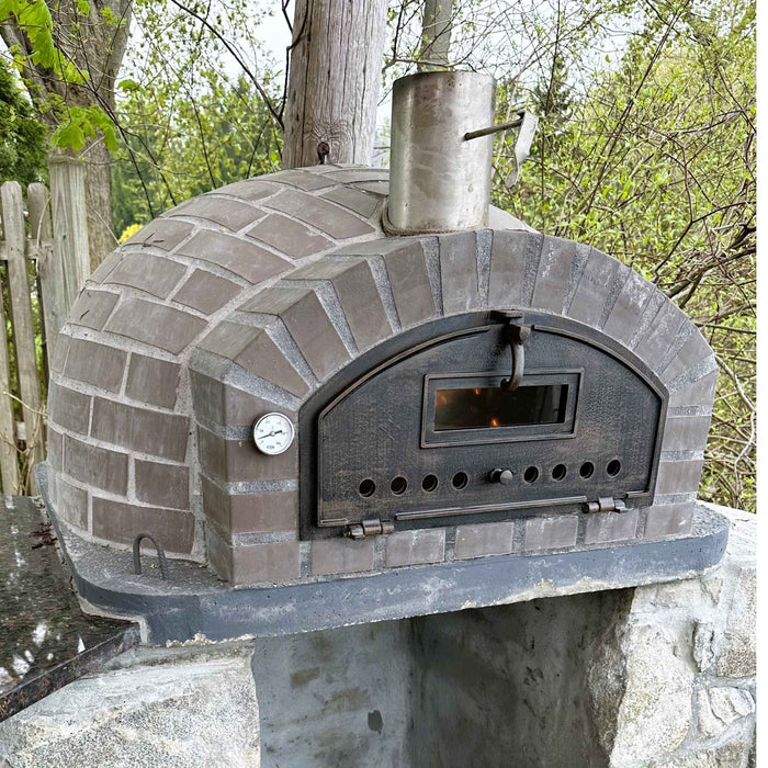 Lume Largo Tudo Premium Pizza Oven installed outdoors on stone base