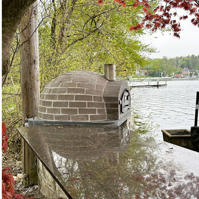 ack view of Lume Largo Tudo Premium Pizza Oven by the lake