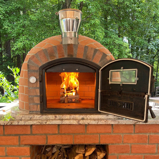 Rustic Lisboa pizza oven with wood fire burning